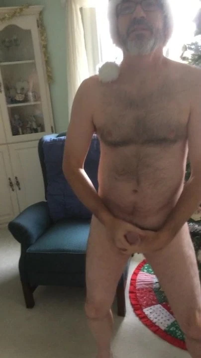 Stripping next to a Christmas tree