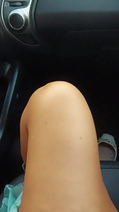 Mature aunt teases her stepson with her sexy legs in the car. | Clip 1