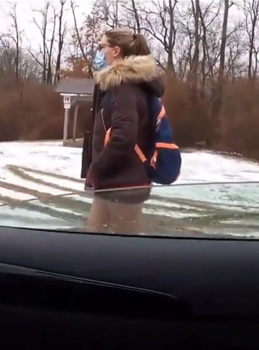 Teen Girl in Plaid Skirt Gets a Ride to School From a Stranger on a Snowy Day