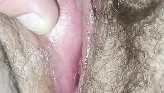My wife's hairy wet cunt close-up