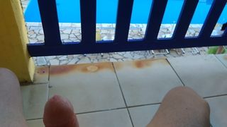 Masturbando na varanda do hotel
