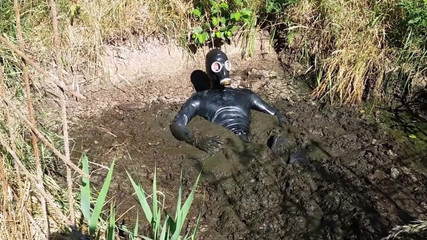 Waders and catsuit very muddy!