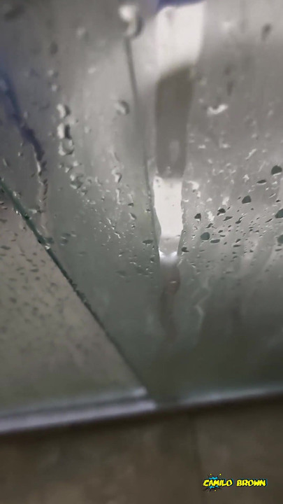 Powerful moment from "Camilo Brown Jerking His Big Uncut Cock in the Shower and Eating His Own Cum"