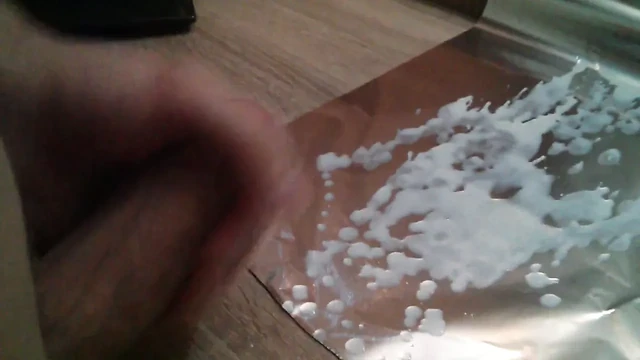 Powerful cumshot on foil!