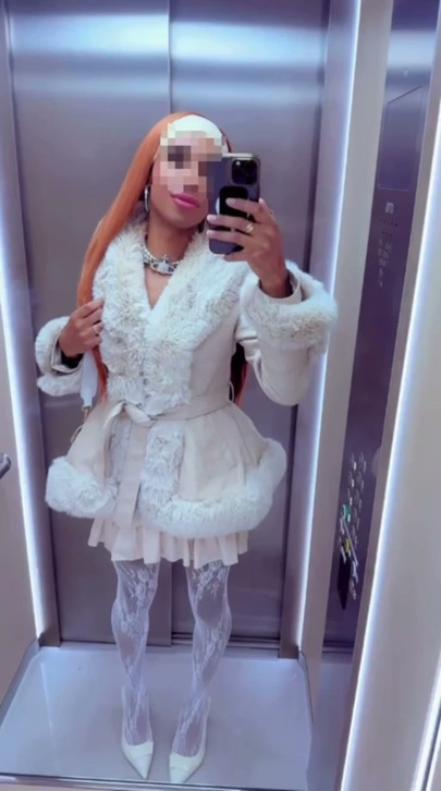 Do you like my white fur coat & lace stockings or would you like to see whats beneath it?