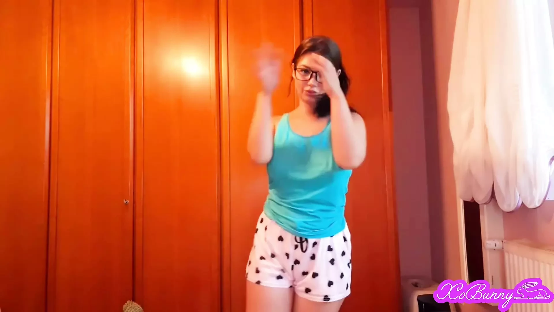 Cute shy nerdy teen performing striptease for you