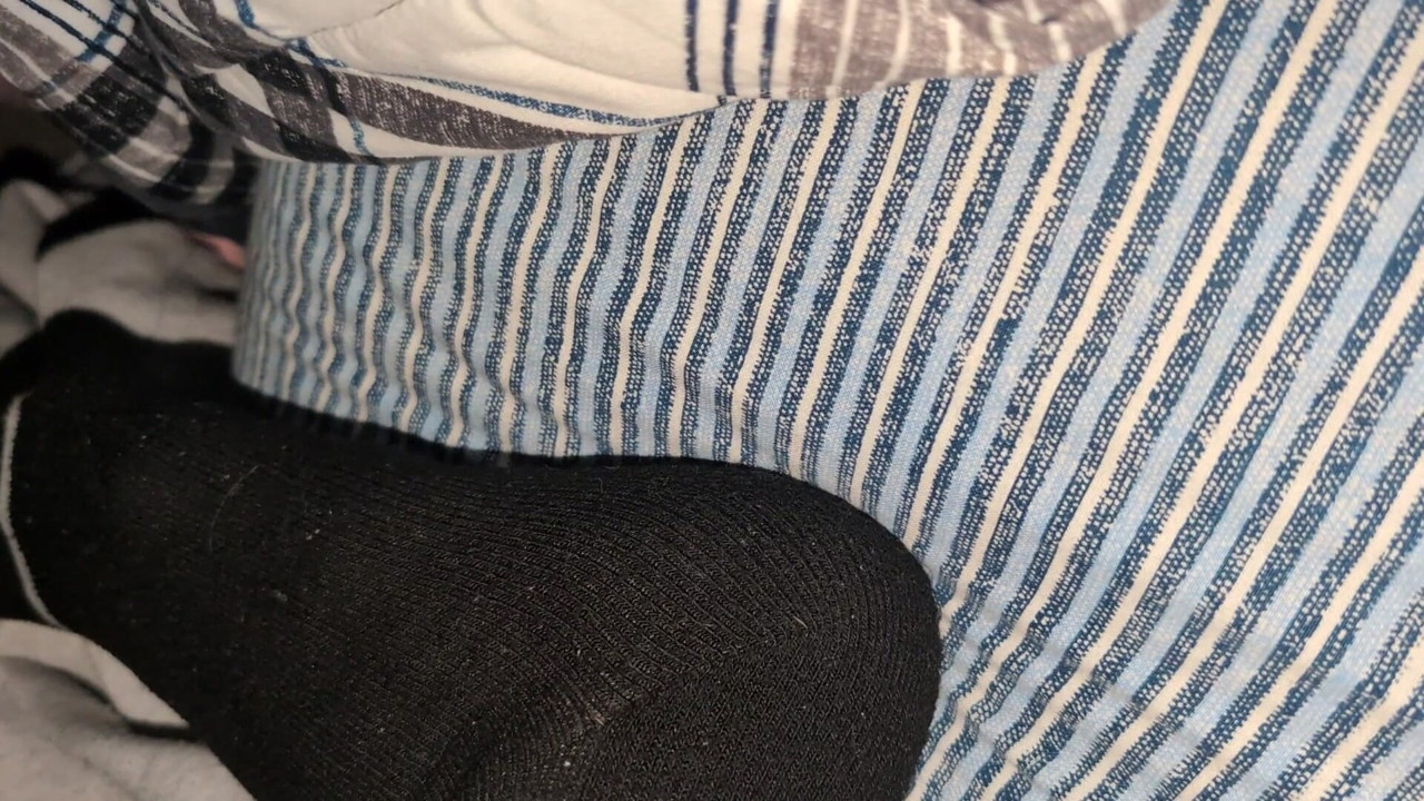 Showing My Sweaty Socked Foot In My Bed