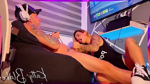 A Pink Pussy Girl Puts a Huge Cock in Her Small Mouth to Suck It While Playing Video Game