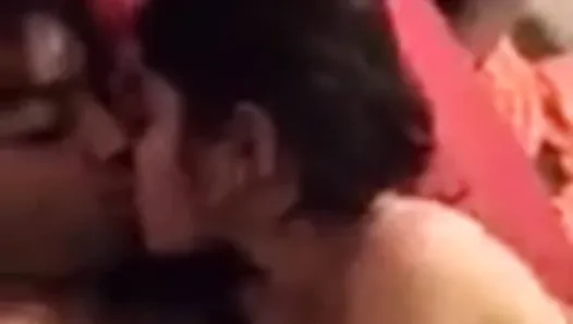 Indian couple enjoying while kissing