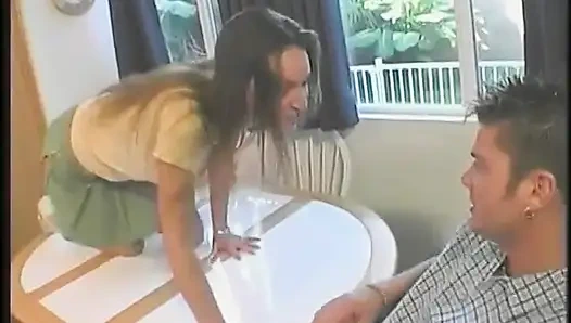 Horny MILF sucks a big cock on the kitchen table