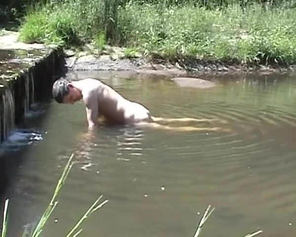 Humping and cumming on a stone in the river