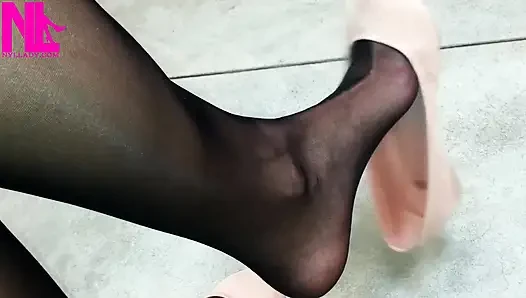 Dangling in Rose Ballet Flats in a Store