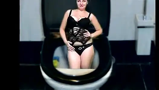 Kate flushing herself to the toilet while dancing part by part of her body