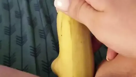 Defiled her cock hole with a banana while her assholes plugg