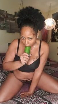 ebony thick milf sucks cucumber