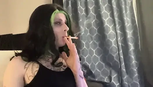 Sexy crossdresser smokes