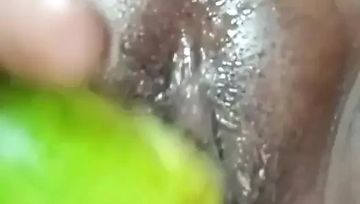 Inserting cucumber in my pussy to satisfy my self