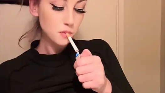 Artemisia Love smoking a cigarette and showing her perfect tits