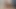 Dizlerinin üzerinde büyük zenci yarağı dildo emiyor