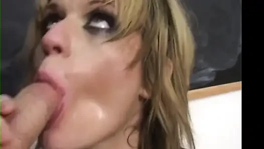 Naughty MILF eats lots of cum from sucking two huge cocks hard