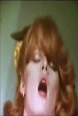 Top Heavy Redhead