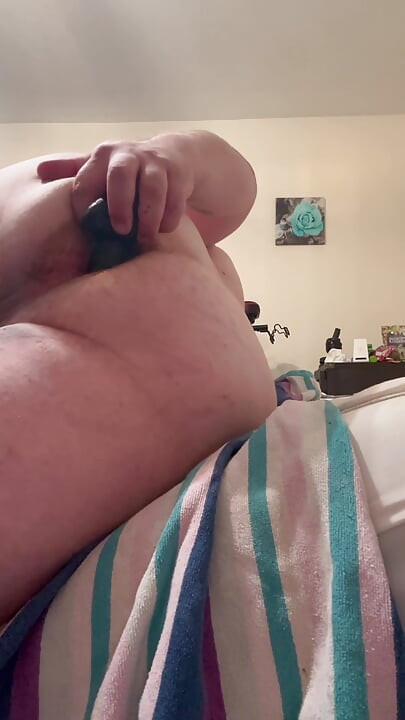 Watch my chubby ass swallow this dildo