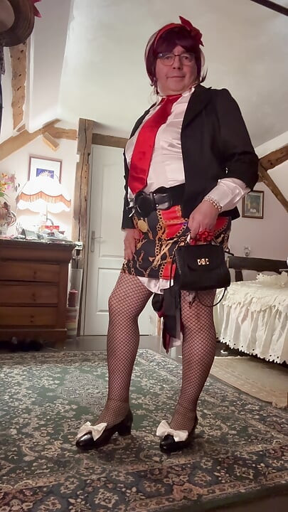 Dressed in a little patterned skirt for an evening out