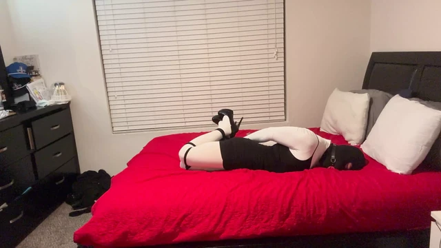 CD ties up in high heels & white tights