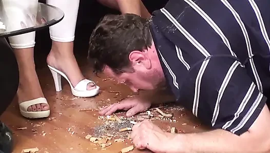 Feeding him from the floor and their shoes