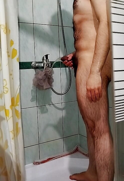 Young Gay showering