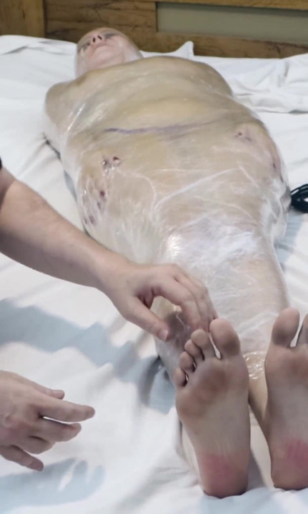 Gabriela in Mummification with Plastic Wrap, Whipping, Bastinado and Tickling