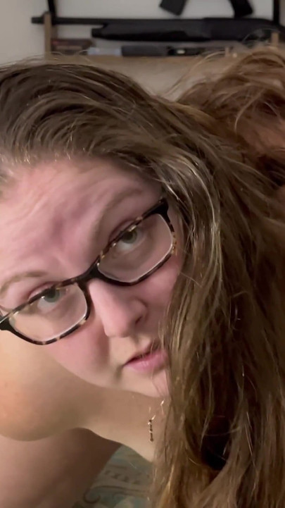 Long haired beauty takes dildo from behind