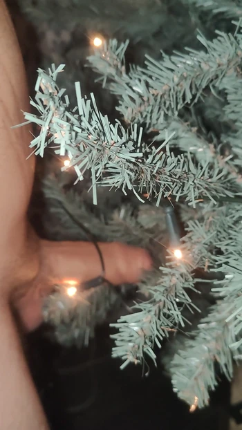 Twink fucks Christmas tree with his thick uncut 6 inch cock