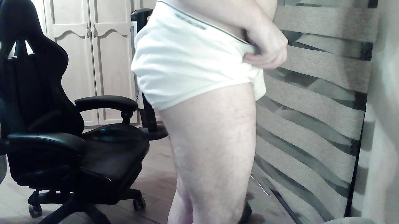 Hot beefy camboy shows off the goods during a show