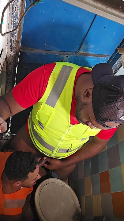 Construction Site Bathroom and Workers