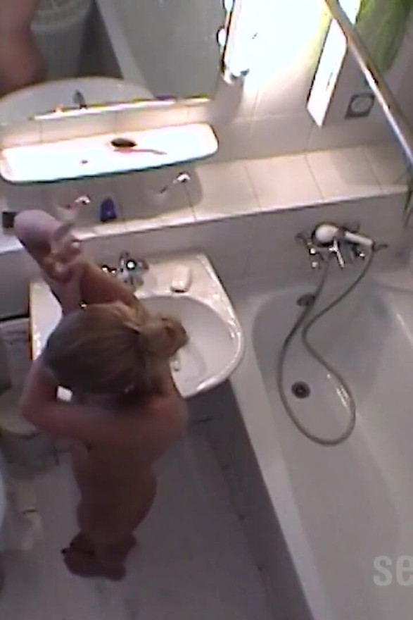 Blonde in the hotel bathroom