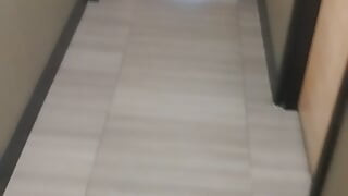 Jerking and cumming in public bathroom hallway