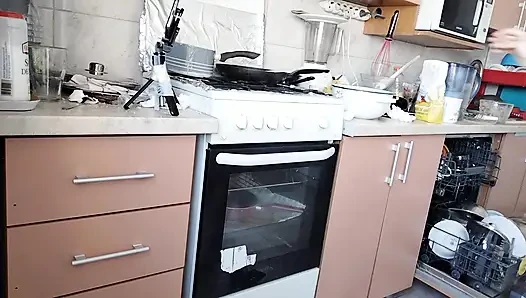 Sexy wife prepares lunch naked in the kitchen.