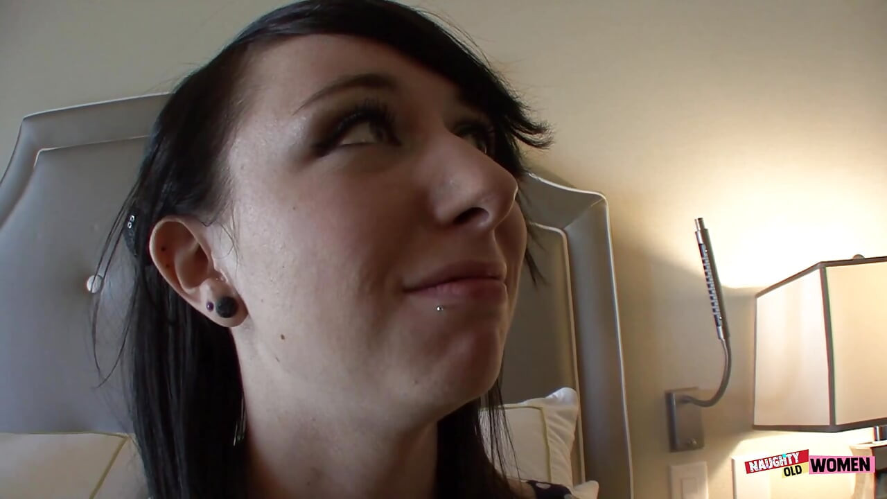 A frisky mature brunette seduces and fucks an inexperienced girl at a Vegas convention