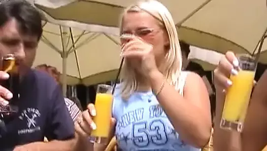 Two amazing blonde chicks from Germany sharing a cock in public