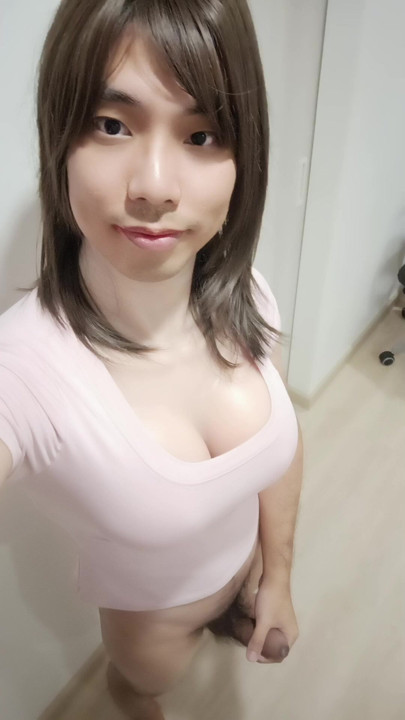 Ladyboy stroking her cock