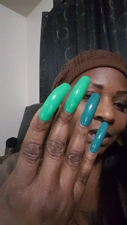 sexy black lady with awesome long nails fingernails
