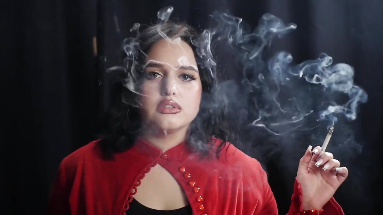Curvy Brunette Smoking in Red Cardigan