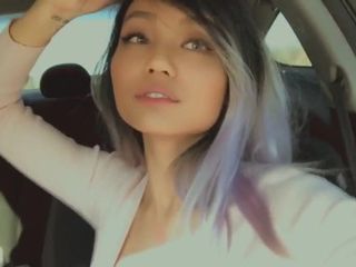Asian Girls Kissing in car