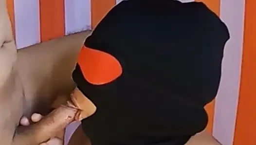 Masked blowjob mature
