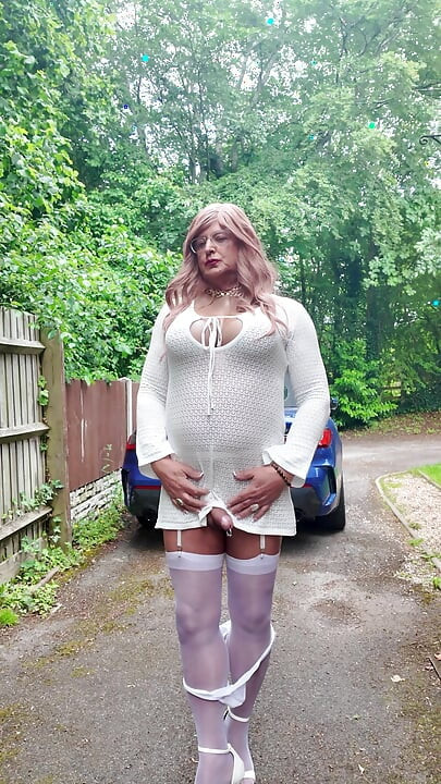 Crossdresser kellycd in white dress stockings and heels