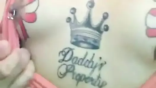 Filipina slut showing off her pierced and tattoo nipples