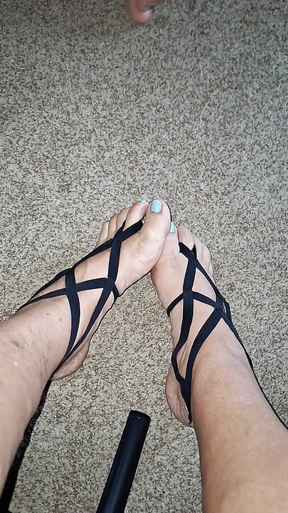 My girlfriend massages the soles of my feet with her soft  feet
