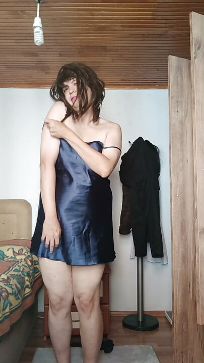 Hot crossdresser in blue dress, black wig & red lips