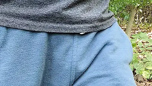 Rubbing myself through my shorts pocket while hiking until I have to stop and cum on the trail